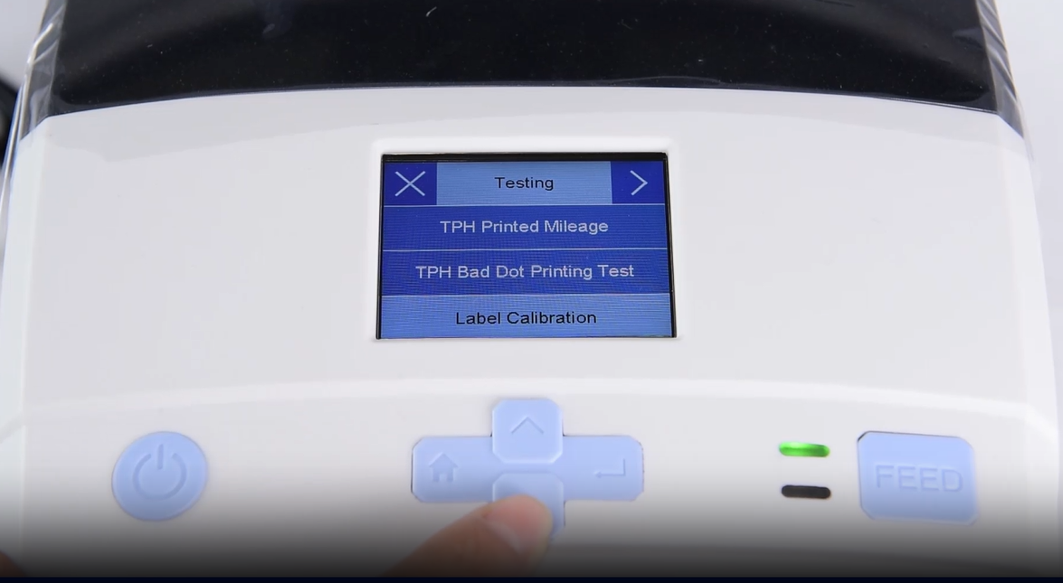 Bir close-up of a machine's digital interface showing a testing menu.